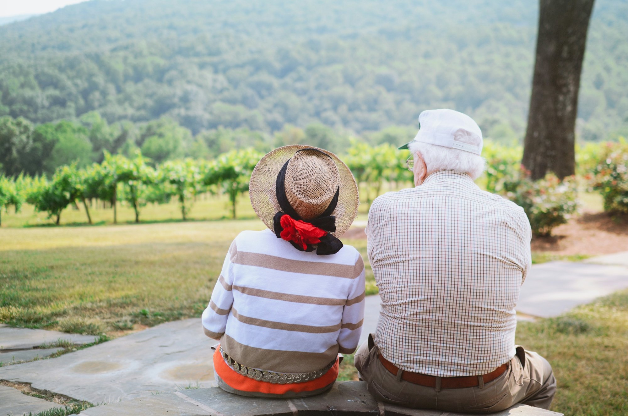 Couple sitting together enjoying their garden